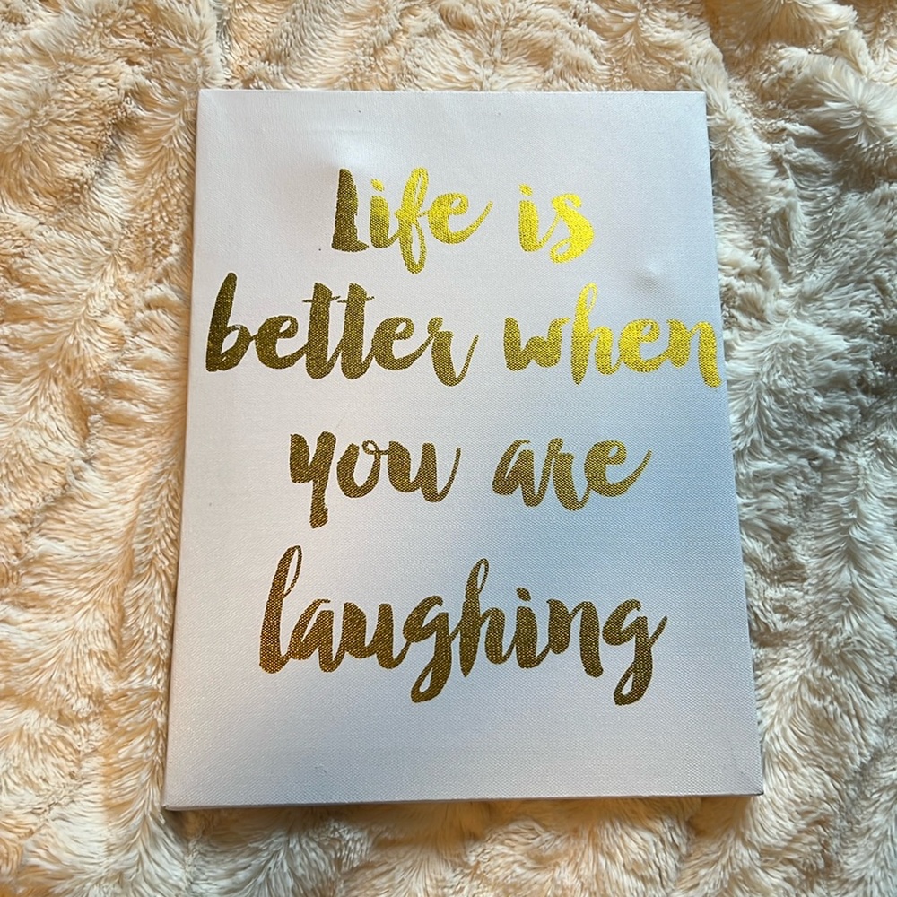 “Life is better when you are laughing” sign